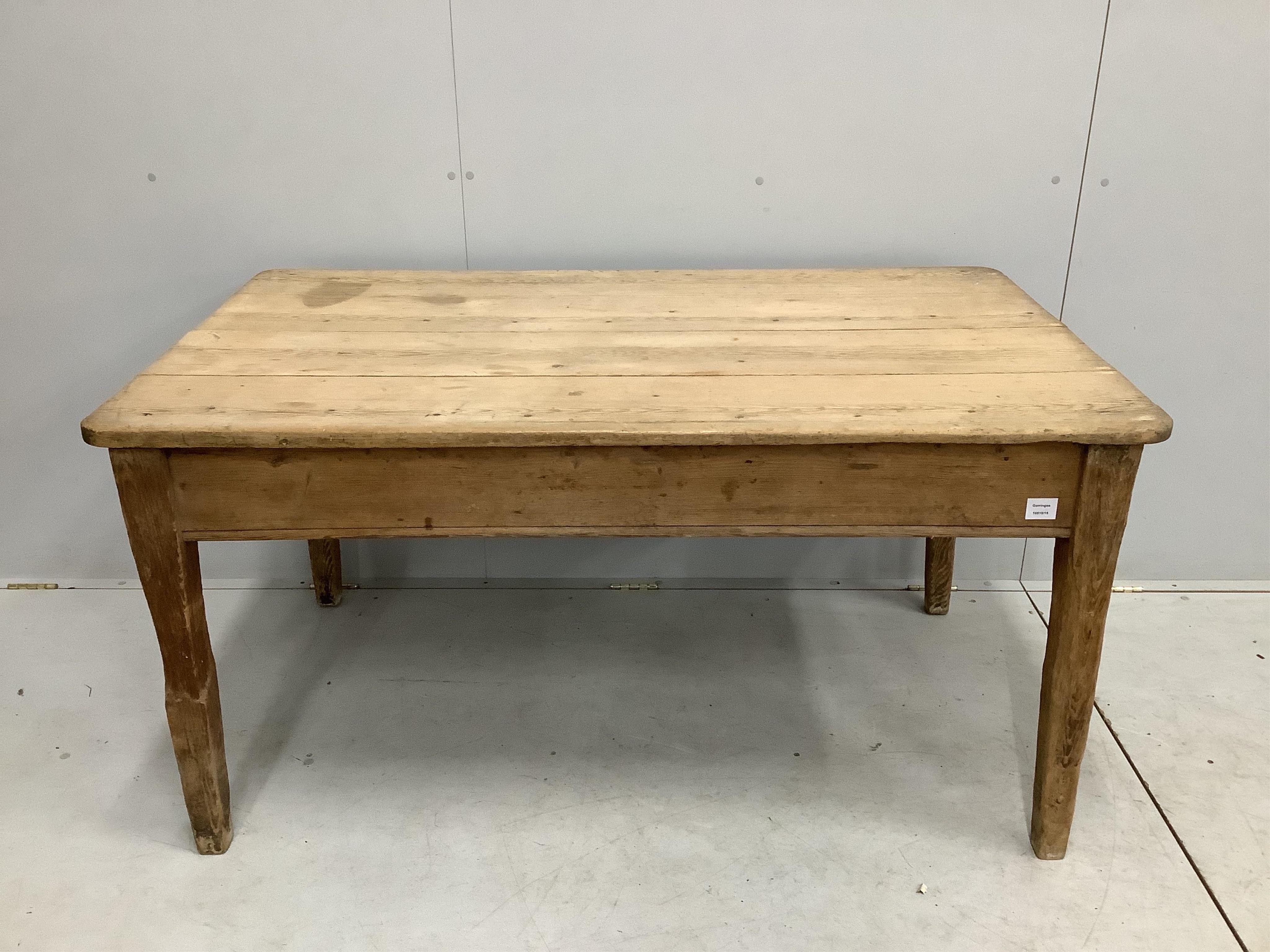 A 19th century rectangular scrubbed pine kitchen table fitted drawer on square tapered legs, width 144cm, depth 85cm, height 73cm. Condition - fair